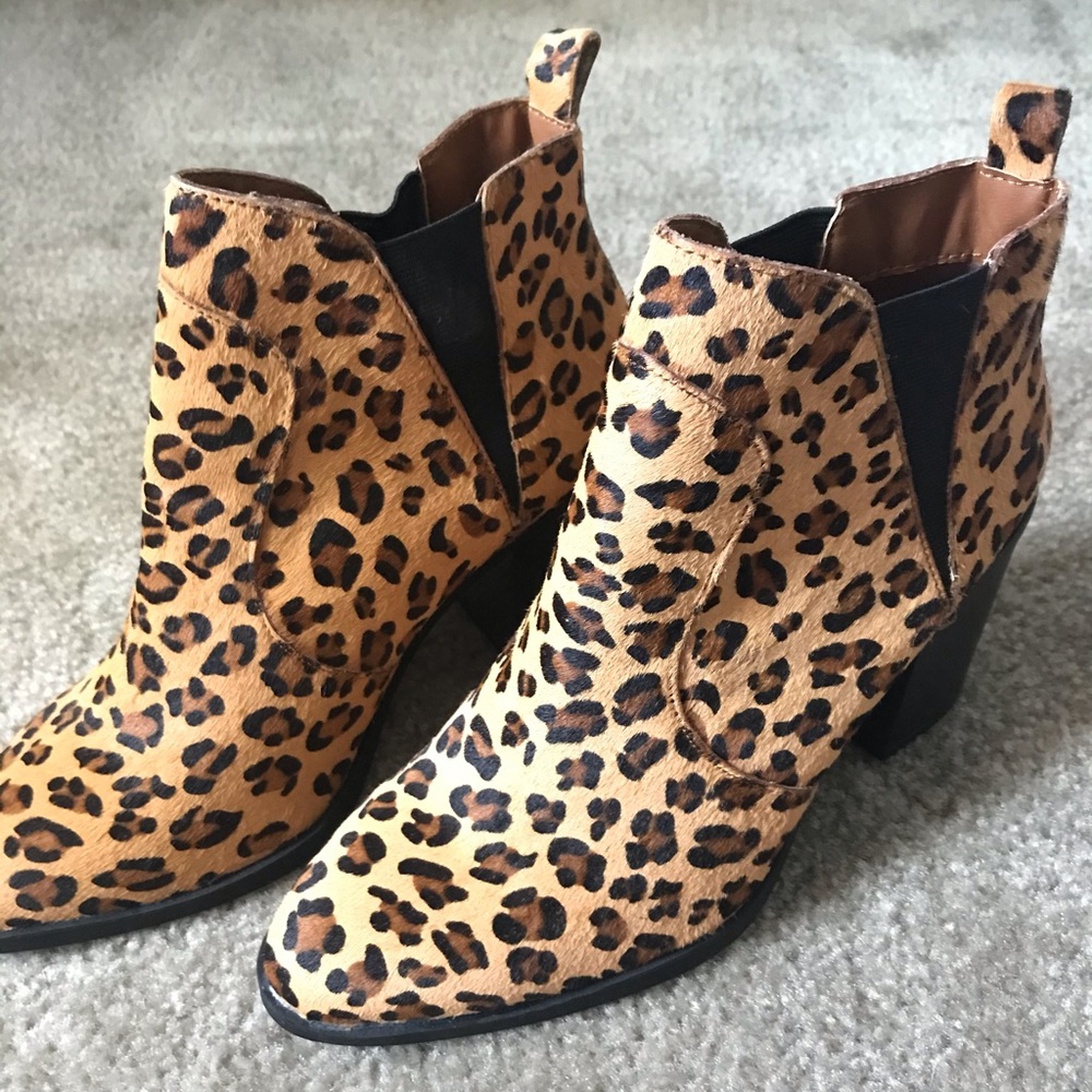 Leopard print heeled boots. Never worn.